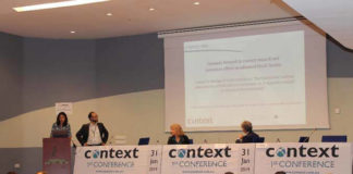 La Dra. Detrell y el Dr. Mougin presentando Context en la sesión de bienvenida de su primera conferencia internacional